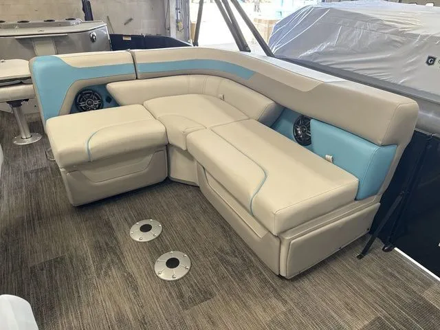 Slide: The Image of Interior of Godfrey Pontoons Sweetwater 2286 FS 2026 with beige and blue seating. - 5