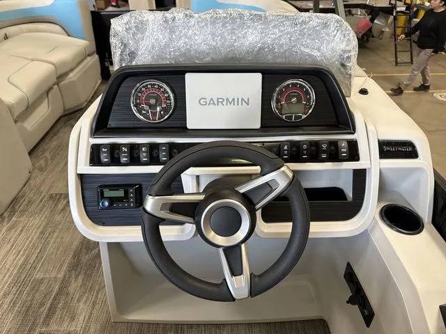 Slide: The Image of Godfrey Pontoons Sweetwater 2286 FS 2026 helm with Garmin system. - 7