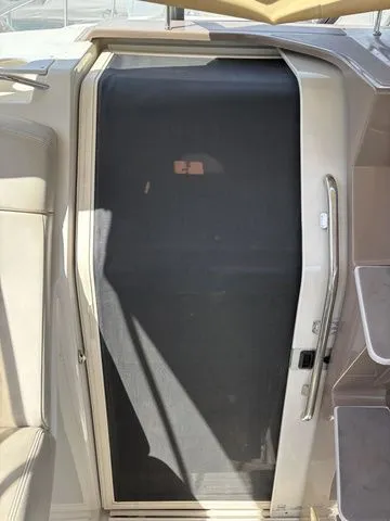 Slide: The Image of Regal Commodore 2765 2002 boat door with sunshade. - 16