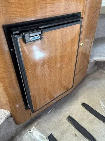 Slide: The Image of Fridge in 2002 Regal Commodore 2765 boat interior. - 18