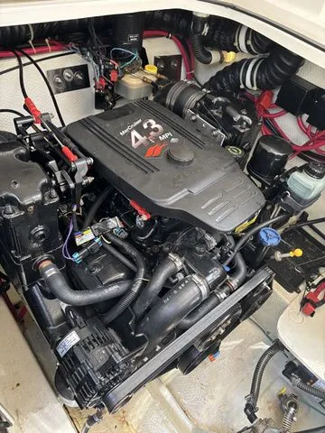 Slide: The Image of Engine compartment of a 2002 Regal Commodore 2765 boat. - 26