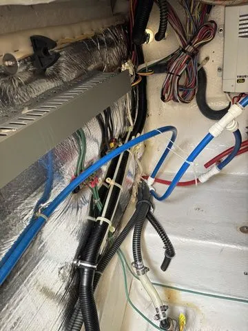 Slide: The Image of Interior wiring view of a 2002 Regal Commodore 2765 boat. - 29