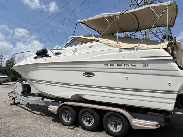Slide: The Image of 2002 Regal Commodore 2765 boat on trailer. - 3