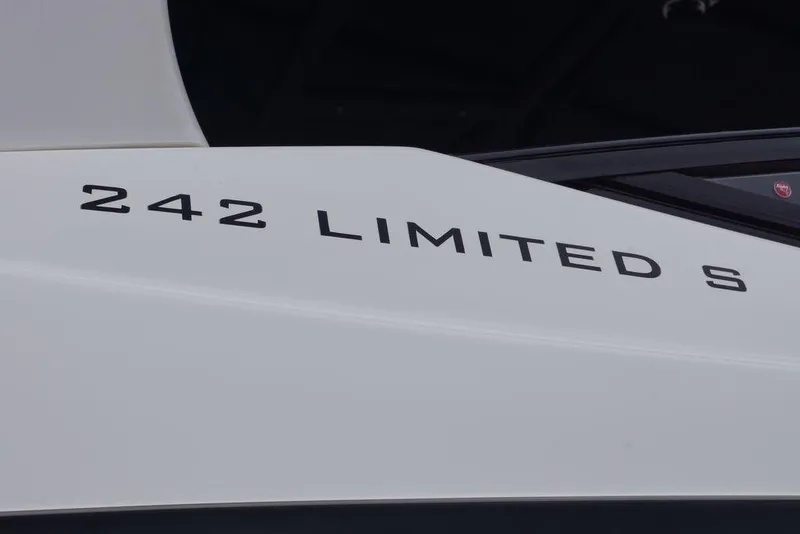 Slide: The Image of 2018 Yamaha Boats 242 Limited S model name on boat exterior. - 7