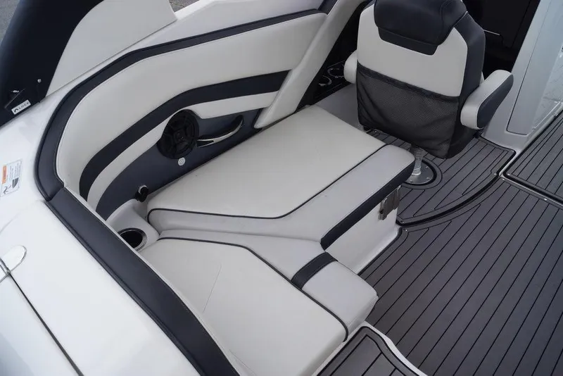 Slide: The Image of 2018 Yamaha Boats 242 Limited S interior seating with sleek design and premium upholstery. - 9