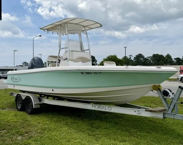 Slide: The Image of 2021 Robalo 226 Cayman boat on trailer, side view. - 10