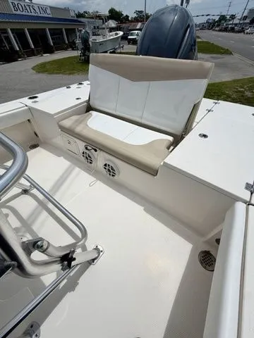 Slide: The Image of Interior of a 2021 Robalo 226 Cayman boat with bench seating. - 5