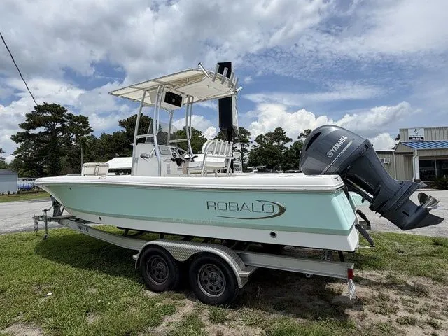 Slide: The Image of 2021 Robalo 226 Cayman boat on trailer, side view. - 6