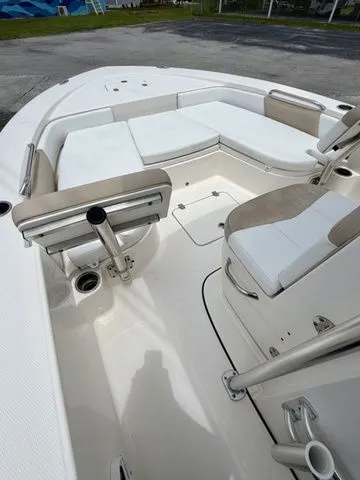 Slide: The Image of Interior view of a 2021 Robalo 226 Cayman boat with white seating. - 7
