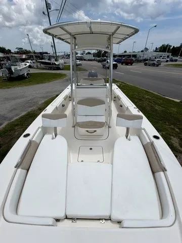 Slide: The Image of 2021 Robalo 226 Cayman boat with spacious deck and seating area. - 8