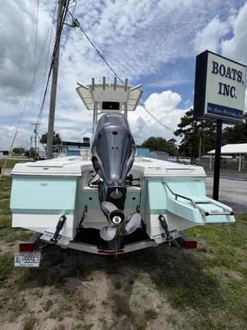 Slide: The Image of 2021 Robalo 226 Cayman boat with outboard motor, parked at Boats Inc. - 9