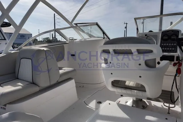 Slide: The Image of Interior of a 2022 Sea Fox 226 Traveler boat with white seating. - 5