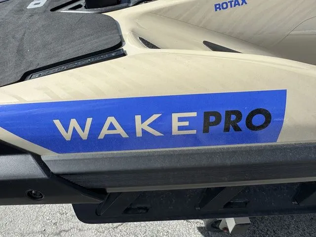 Slide: The Image of Sea-Doo Wake Pro 2025 jet ski side view with blue logo. - 10