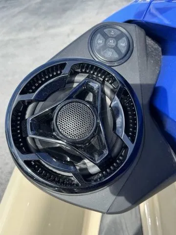 Slide: The Image of Speaker and controls on the 2025 Sea-Doo Wake jet ski. - 13