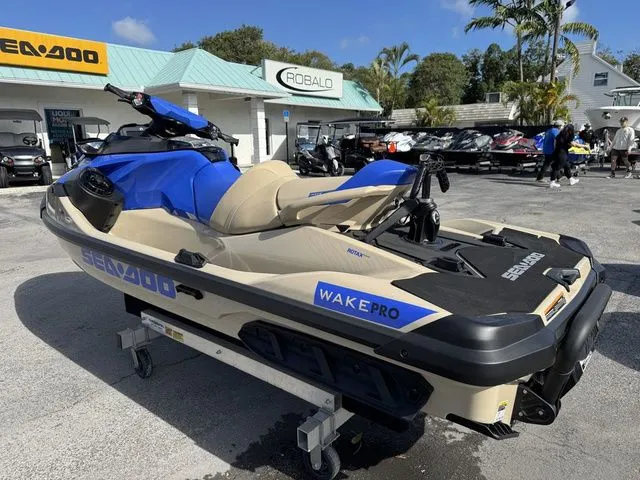 Slide: The Image of 2025 Sea-Doo Wake Pro jet ski outdoors on a trailer. - 6
