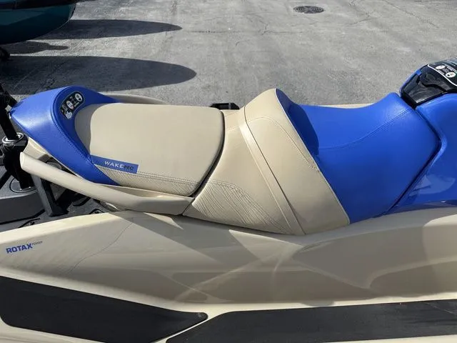 Slide: The Image of 2025 Sea-Doo Wake jet ski with blue and beige seat. - 9