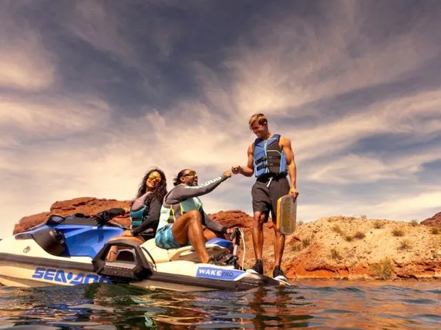 Slide: The Image of Three people enjoying a 2026 Sea-Doo Wake on the water. - 3