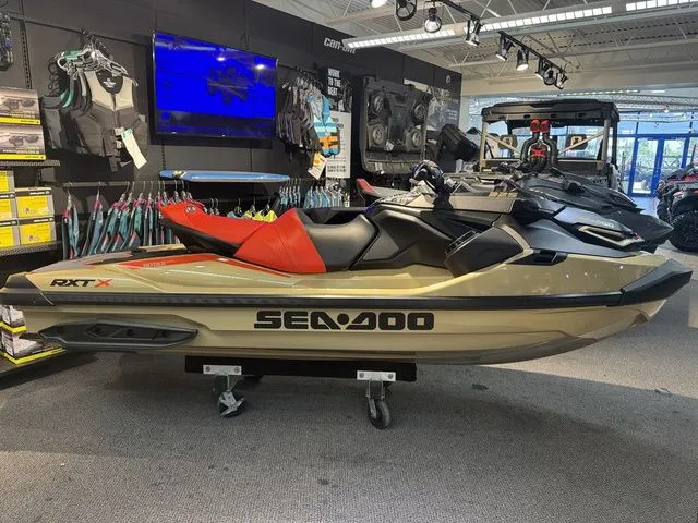 The Image of 2025 Sea-Doo RXT-X jet ski displayed in showroom. - 1