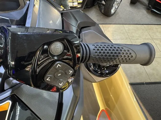 Slide: The Image of Close-up of Sea-Doo RXT-X 2025 handlebar grip and controls. - 12
