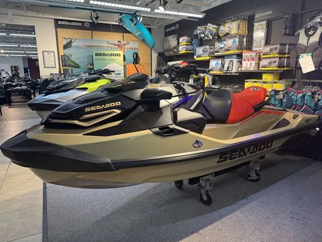 Slide: The Image of 2025 Sea-Doo RXT-X jet ski in showroom. - 4