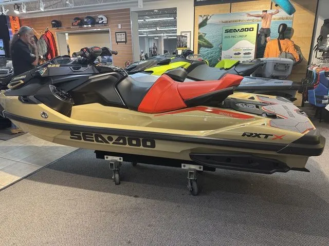 Slide: The Image of 2025 Sea-Doo RXT-X jet ski in showroom. - 5