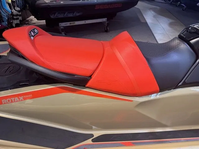 Slide: The Image of 2025 Sea-Doo RXT-X jet ski with red seat and Rotax Power. - 7