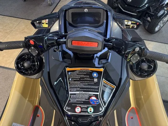 Slide: The Image of 2025 Sea-Doo RXT-X jet ski dashboard and controls. - 9