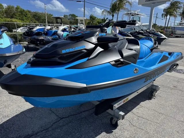 Slide: The Image of 2026 Sea-Doo RXT-X jet ski in blue on a trailer. - 4