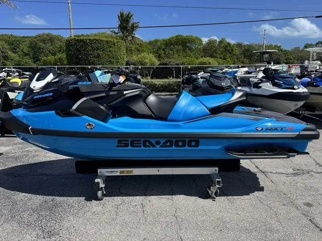 Slide: The Image of 2026 Sea-Doo RXT-X jet ski in blue on a trailer. - 5