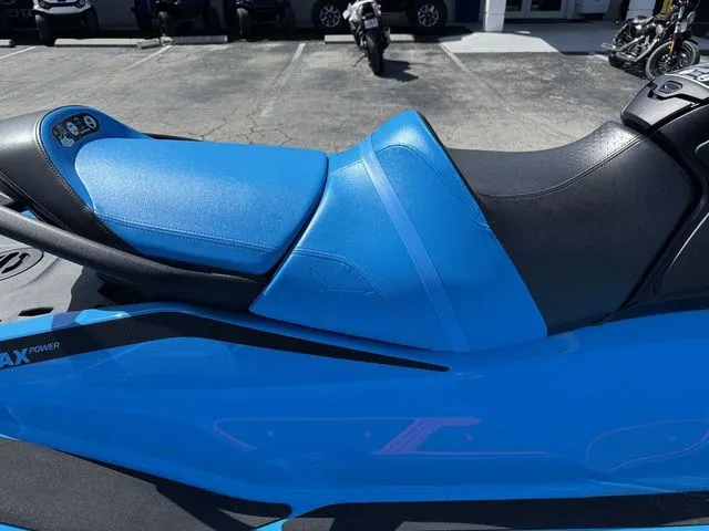 Slide: The Image of 2026 Sea-Doo RXT-X jet ski in vibrant blue. - 8