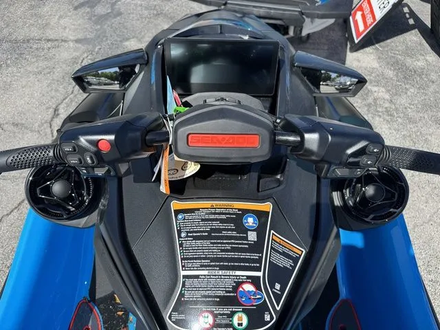 Slide: The Image of 2026 Sea-Doo RXT-X jet ski cockpit with controls and display. - 9