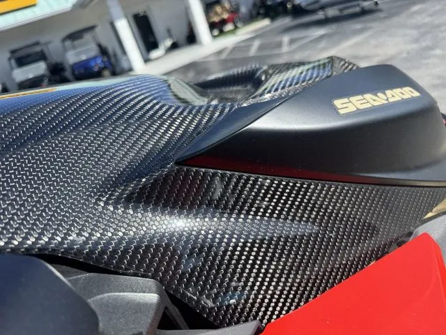 Slide: The Image of Close-up of 2025 Sea-Doo RXP-X 325 jet ski with carbon fiber details. - 10
