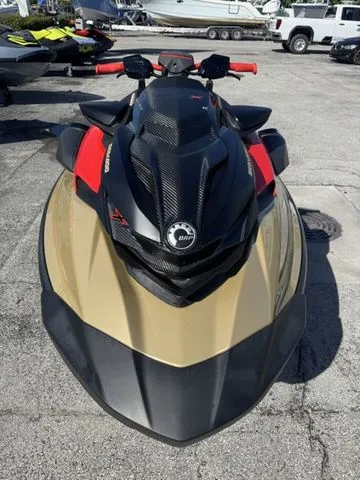 Slide: The Image of 2025 Sea-Doo RXP-X 325 jet ski in black and gold. - 3