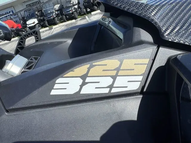 Slide: The Image of Close-up of Sea-Doo RXP-X 325 jet ski, 2025 model. - 9