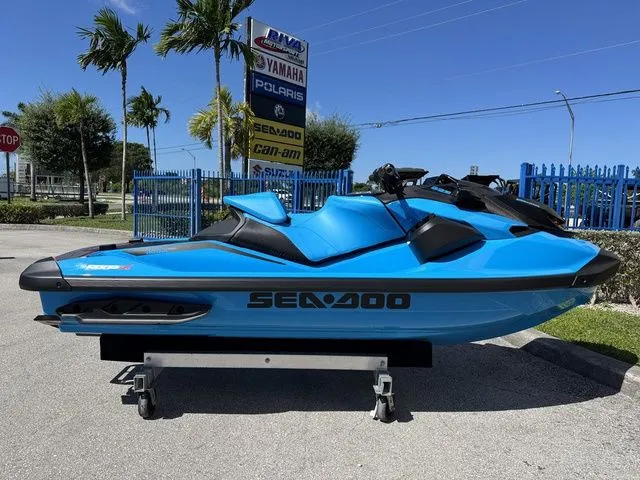 The Image of 2026 Sea-Doo RXP-X 325 in Gulfstream Blue on parking lot. - 1