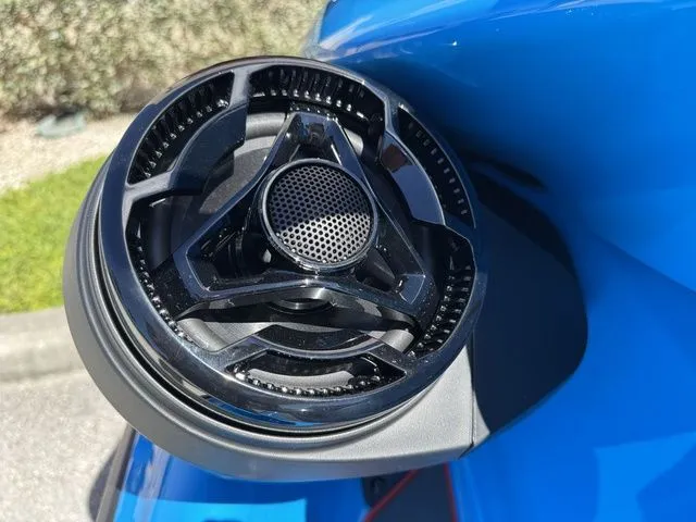 Slide: The Image of Close-up of a speaker on a blue 2026 Sea-Doo RXP-X™ 325. - 16