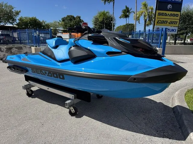 Slide: The Image of 2026 Sea-Doo RXP-X™ 325 in Gulfstream Blue on a trailer. - 2