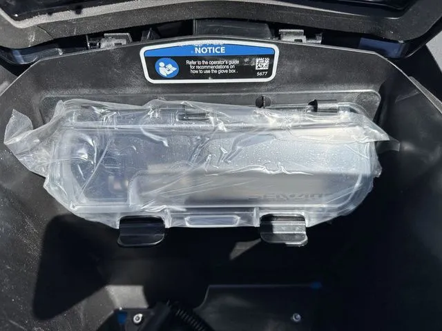 Slide: The Image of Interior view of Sea-Doo RXP-X™ 325 Tech 2026 storage compartment. - 23