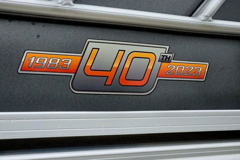 Slide: The Image of Sun Tracker Party Barge 20 DLX 40th Anniversary logo, 1983-2023 celebration. - 4