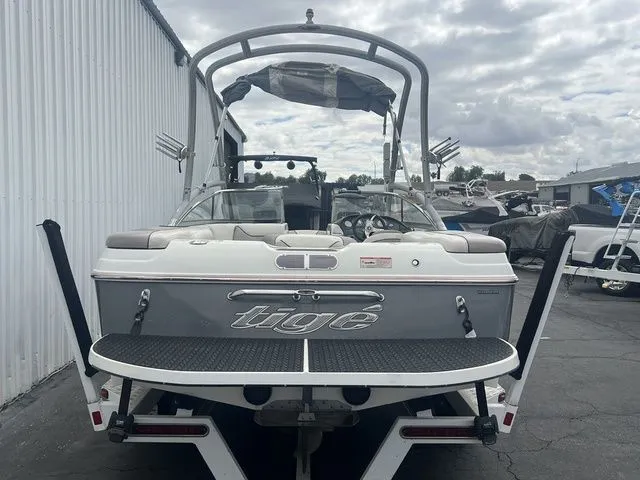 Slide: The Image of Rear view of a 2008 Tigé 22i boat outdoors. - 16
