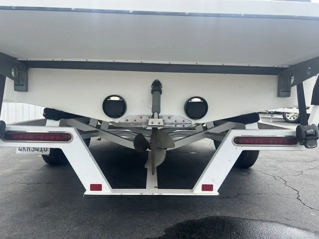 Slide: The Image of Rear view of a 2008 Tigé 22i boat on a trailer. - 4