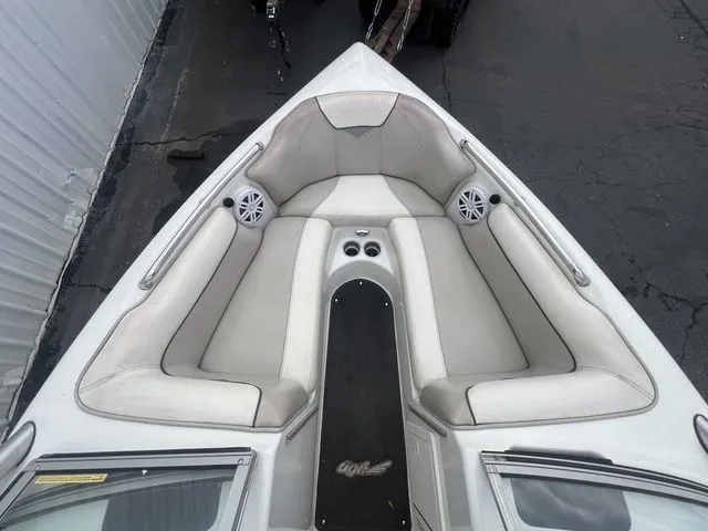 Slide: The Image of Interior view of a 2008 Tigé 22i boat with gray seating. - 9