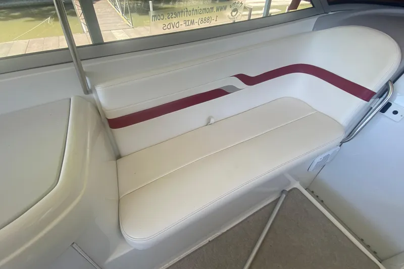 Slide: The Image of 2001 Formula 330 Sun Sport boat interior with white and red seating. - 12