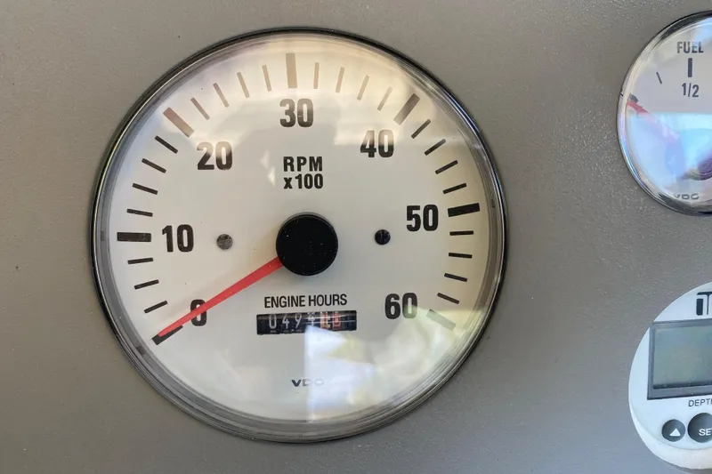 Slide: The Image of Tachometer of 2001 Formula 330 Sun Sport showing RPM and engine hours. - 15