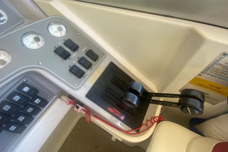 Slide: The Image of Control panel of a 2001 Formula 330 Sun Sport boat with gauges and switches. - 17
