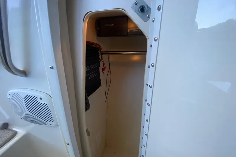 Slide: The Image of Interior view of a 2001 Formula 330 Sun Sport boat with Kenwood audio equipment. - 26