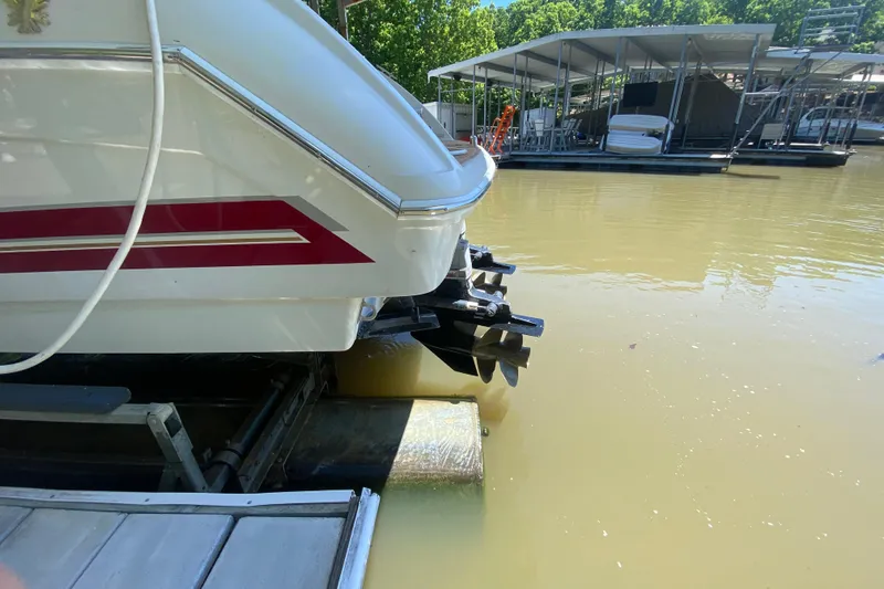 Slide: The Image of 2001 Formula 330 Sun Sport boat docked on a sunny day. - 33