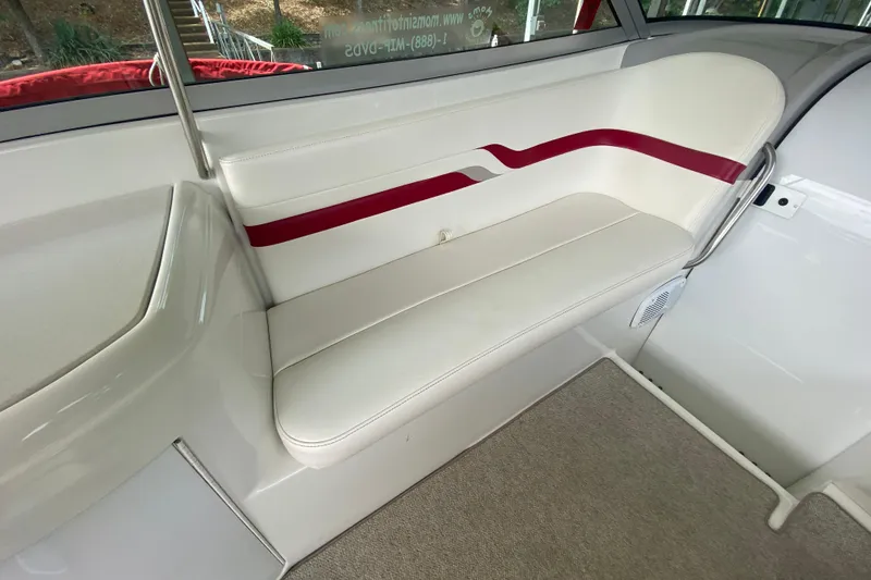Slide: The Image of 2001 Formula 330 Sun Sport boat interior with white and red seating. - 43