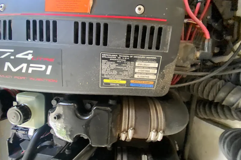 Slide: The Image of Engine compartment of a 2001 Formula 330 Sun Sport with 7.4L MPI engine. - 49