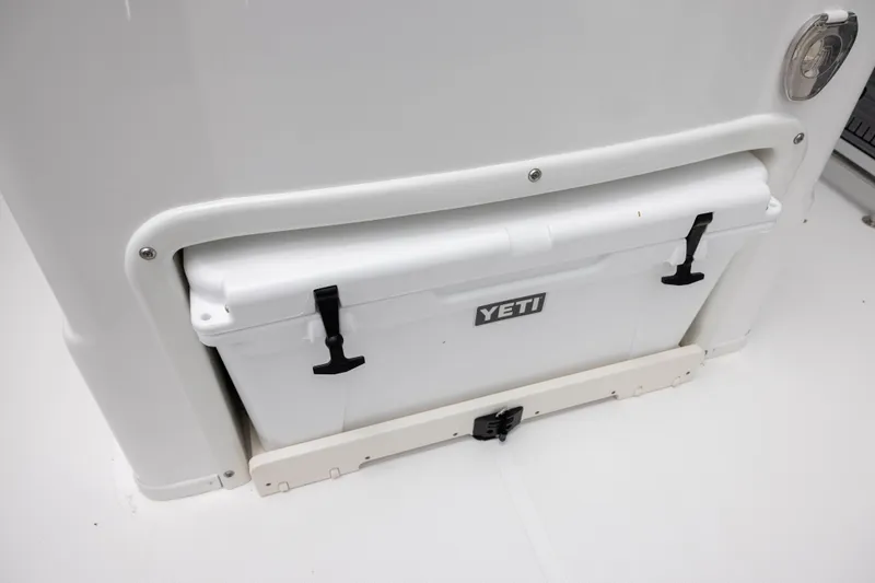 Slide: The Image of 2024 NauticStar 292 Legacy boat with integrated Yeti cooler storage. - 8
